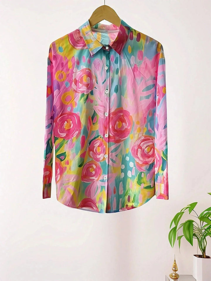 Comfortable women's long sleeve blouse featuring a unique abstract print & button-front. Elegant casual top.