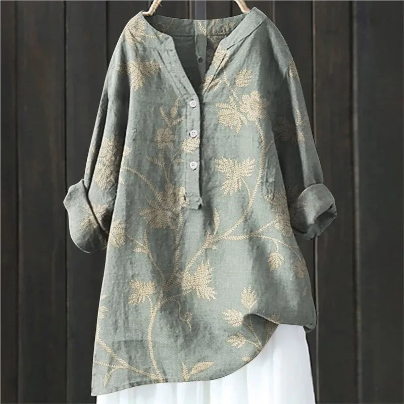 Women's elegant floral print blouse, versatile summer top, comfortable casual style.