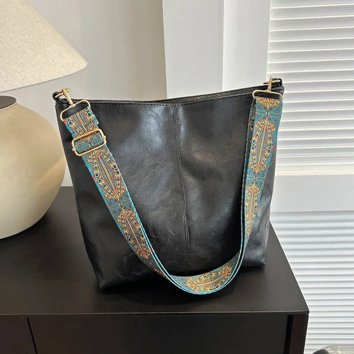 Versatile women's cross body leather bag, durable & stylish, perfect for daily use.