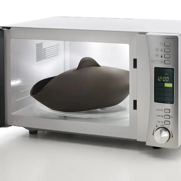 Homemade bread baking mould. Perfect for steaming delicious bread. Essential non-stick kitchen tool.