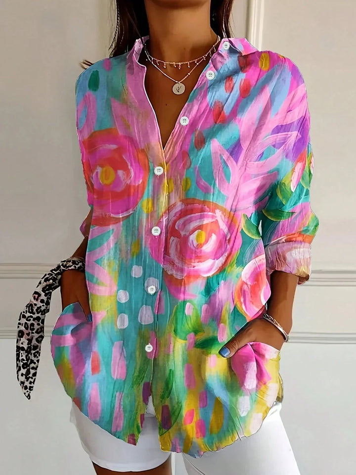 Women's abstract print button-front blouse. Long sleeve, relaxed fit for effortless casual style.