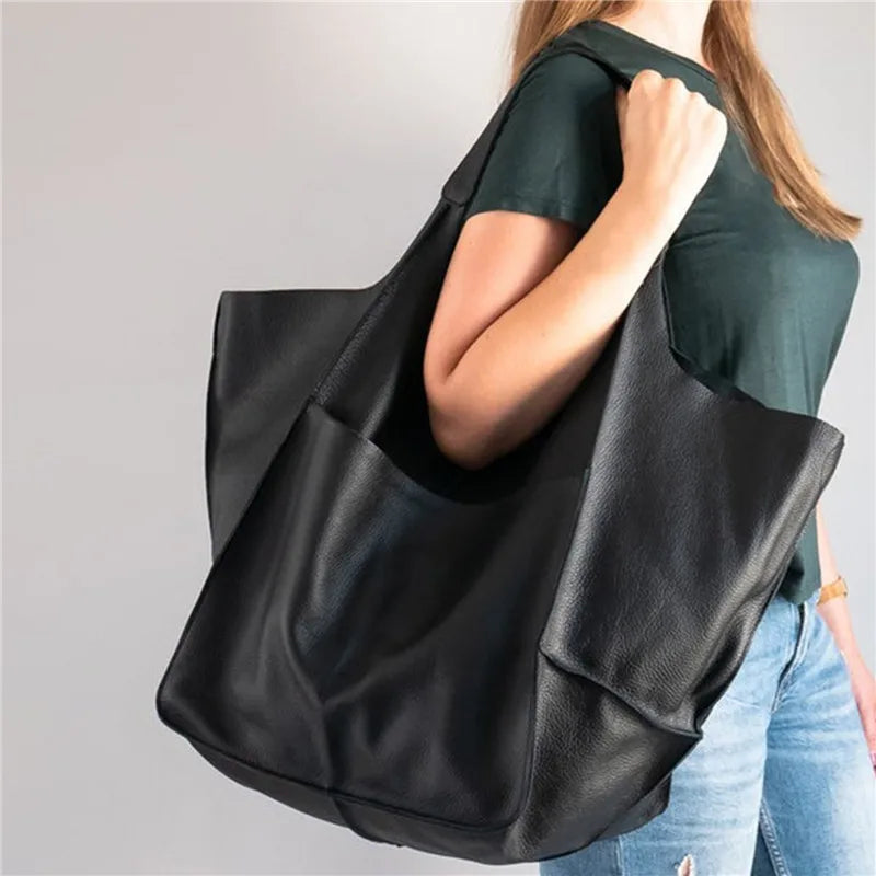 Elegant vintage women's genuine leather crossbody bag with adjustable strap, a timeless fashion accessory.