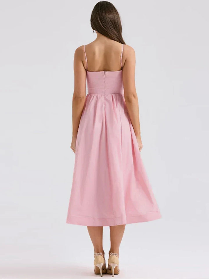 Chic women's sleeveless A-line maxi strap dress with an elegant scoop neck. Ideal for sophisticated party & evening wear.