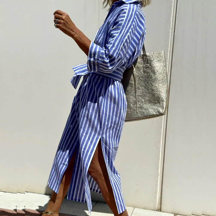 Elegant women's striped button-down shirtdress, a chic choice for versatile everyday and professional style.