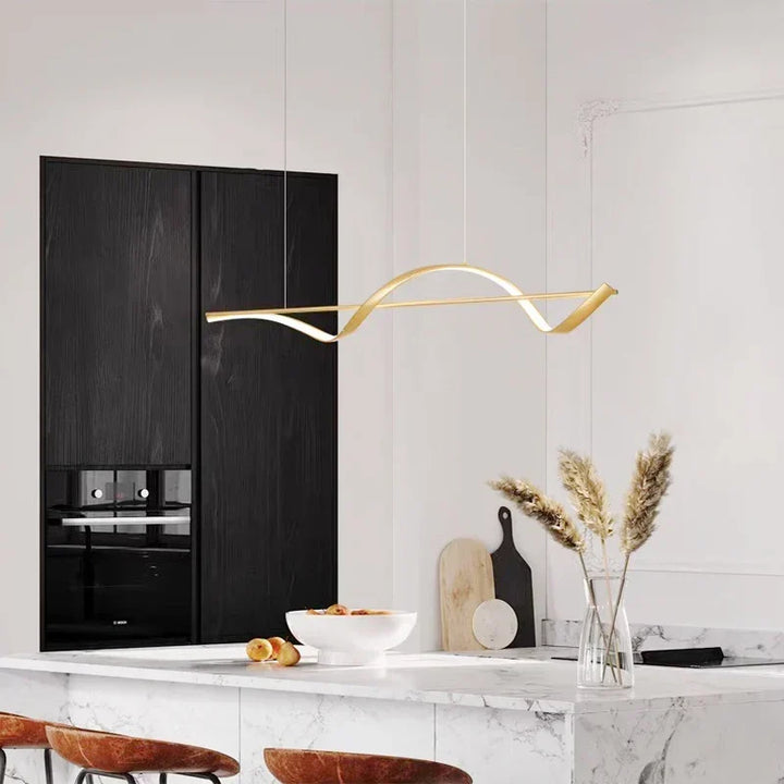 Energy efficient wavy LED pendant light, perfect for modern kitchen island illumination.