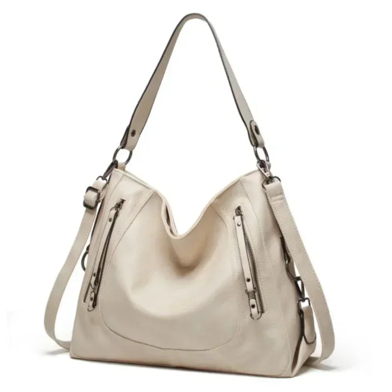 Elegant women's vintage leather shoulder bag, a stylish and spacious everyday handbag. Premium fashion accessory.