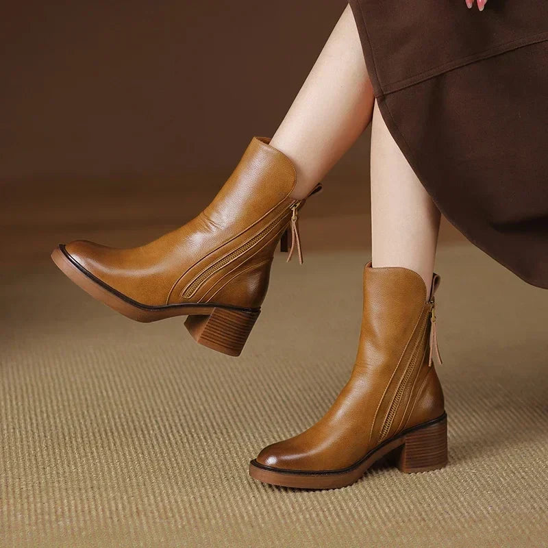 Versatile women's Emery zip ankle boots. Elegant platform heel, ideal for fall fashion & winter comfort. Chic footwear.