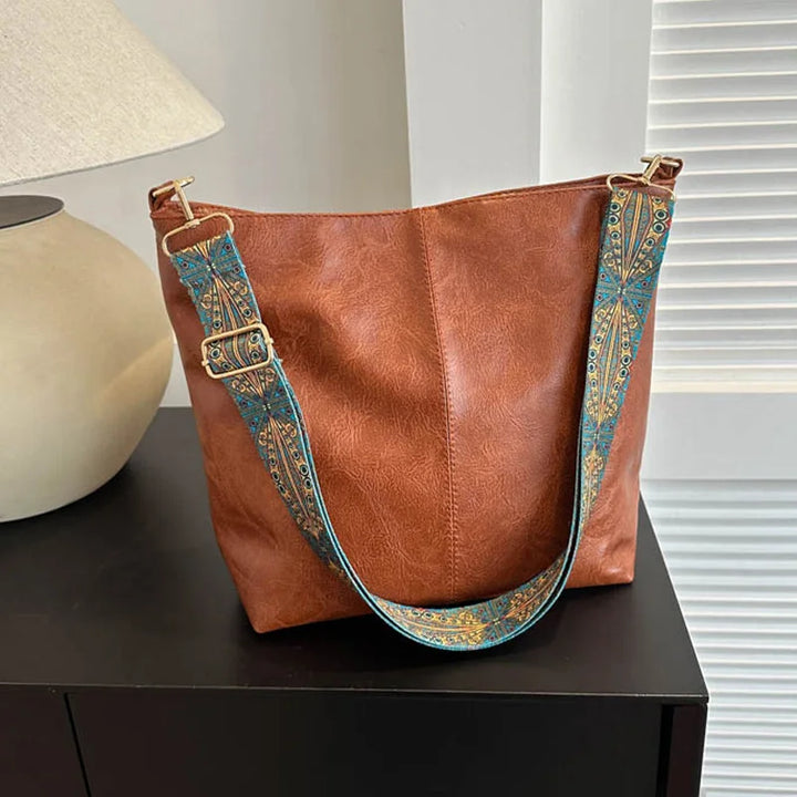 Women's vintage genuine leather shoulder bag, timeless style for everyday elegance.