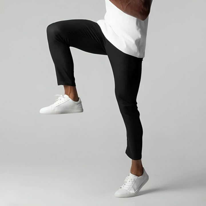 Stylish men's modern fit slim chinos, comfortable stretch pants for casual or smart-casual outfits.