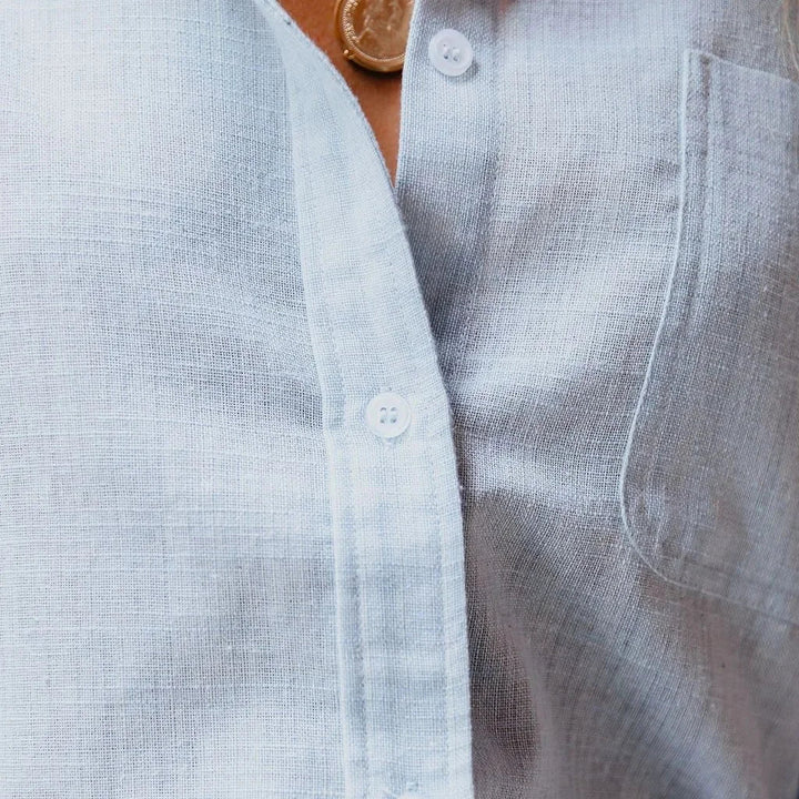 Stylish women's elegant button-up blouse, a versatile long sleeve top for office wear and smart casual looks.