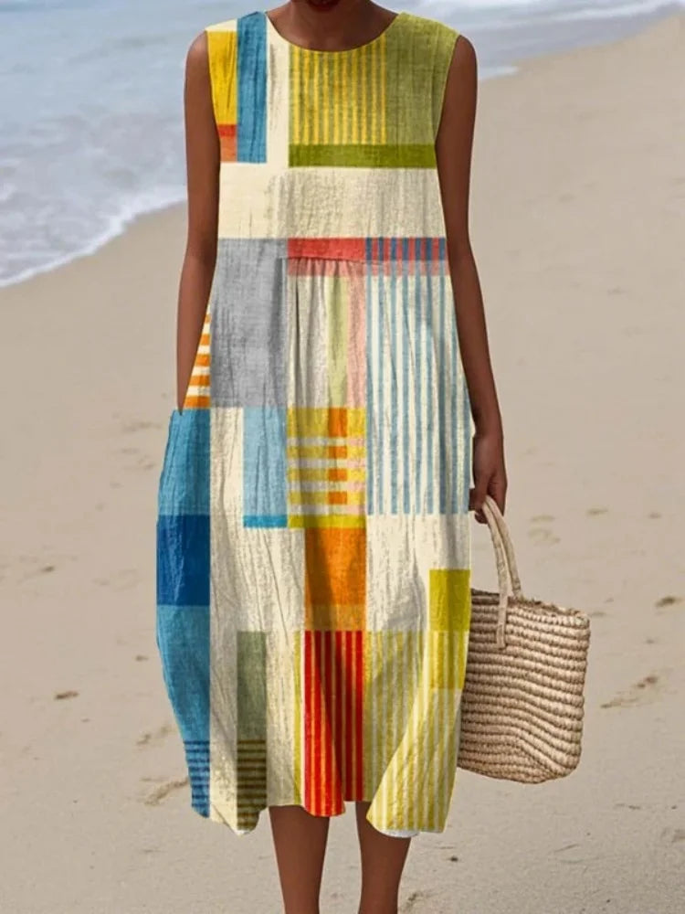 Sleeveless art print midi dress for women, featuring a modern geometric design. Versatile for casual or work.