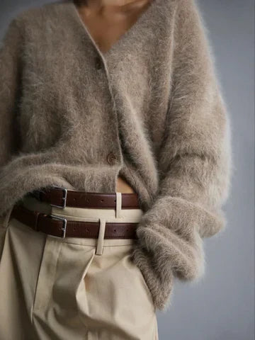 Elegant women's relaxed fit cardigan, a versatile knitwear piece for sophisticated layering.