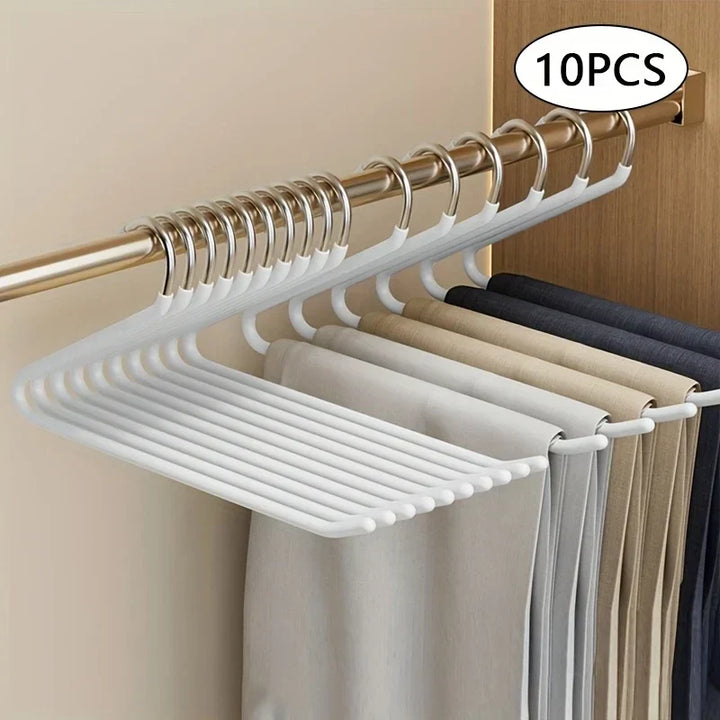 Efficient open metal trouser hangers for a clutter-free closet. Sturdy, anti-rust & space-saving for all pant types.