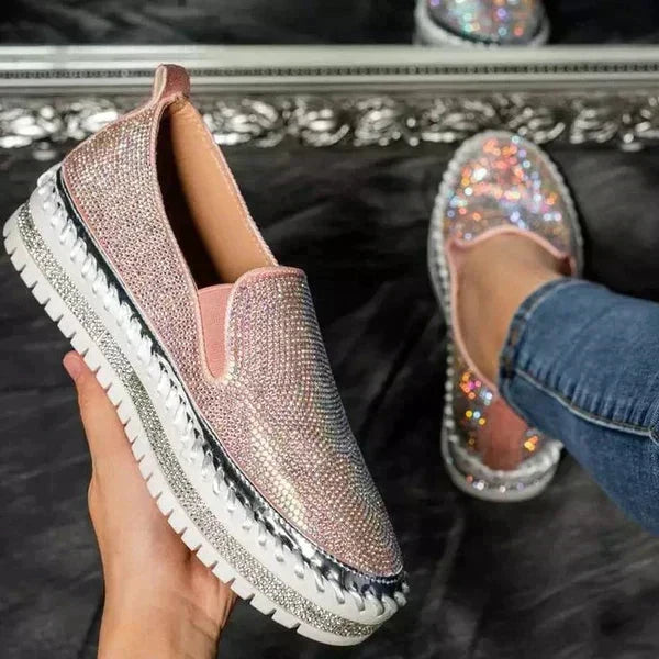 Chic women's comfortable loafers with gold accent. Versatile slip-on shoes perfect for elegant casual or dress wear.