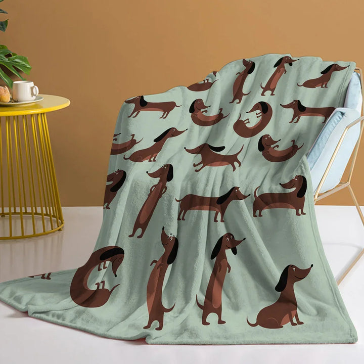 Dachshund print soft flannel throw blanket in light green. Ideal for home decor, cozy warmth on sofa or bed.
