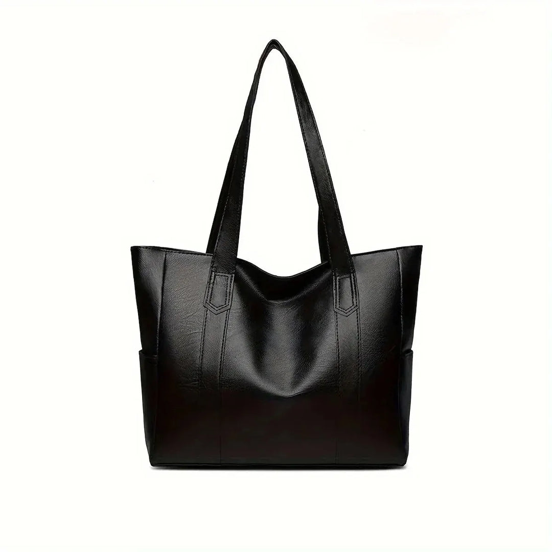 Stylish black genuine leather crossbody bag for women. A timeless fashion accessory, durable & elegant.