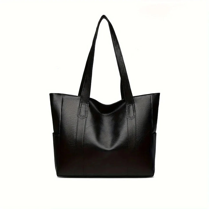 Stylish black genuine leather crossbody bag for women. A timeless fashion accessory, durable & elegant.