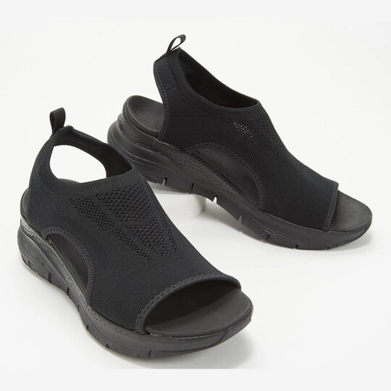 Pair of women's non-slip orthopedic sandals. Features arch support, comfortable straps, perfect for summer footwear.