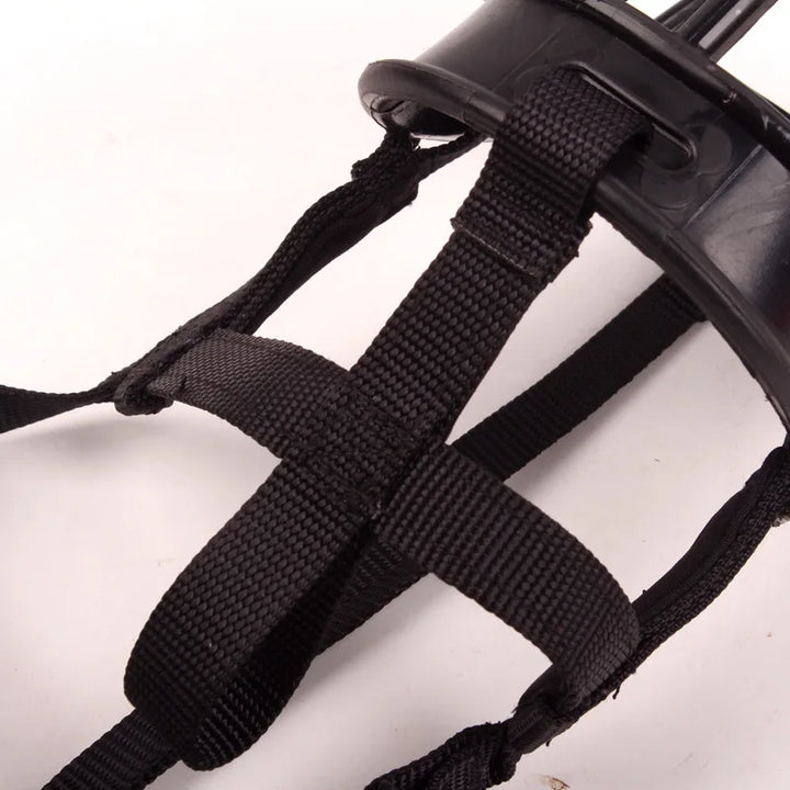 Flexible silicone dog muzzle for responsible pet training, safety & preventing unwanted chewing or barking.