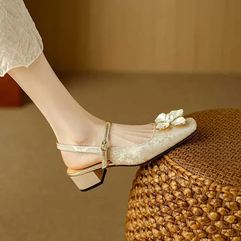 Pointed-toe floral jacquard block-heel pumps, offering elegant style & comfort for women.