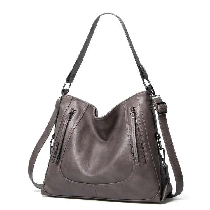 Brown vintage leather shoulder bag for women, spacious & stylish everyday handbag. Premium quality fashion.
