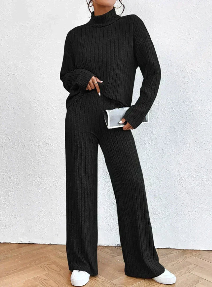 Model wearing a comfortable women's ribbed turtleneck loungewear set, great for fall & winter casual outfits.