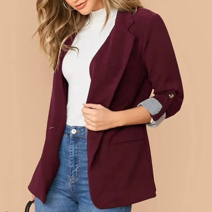 Professional office fashion women's blazer. Modern elegant outerwear, a chic tailored workwear jacket.