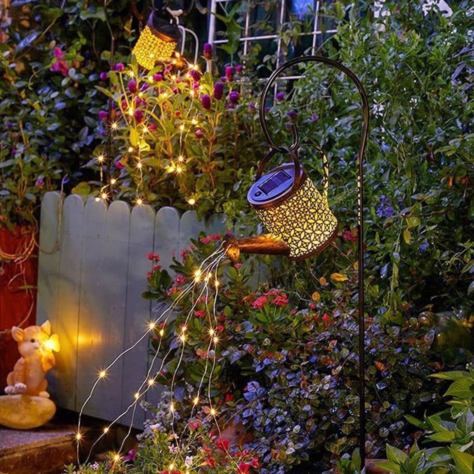 Decorative solar watering can LED light, creating a beautiful pouring light effect for garden & landscape decor.
