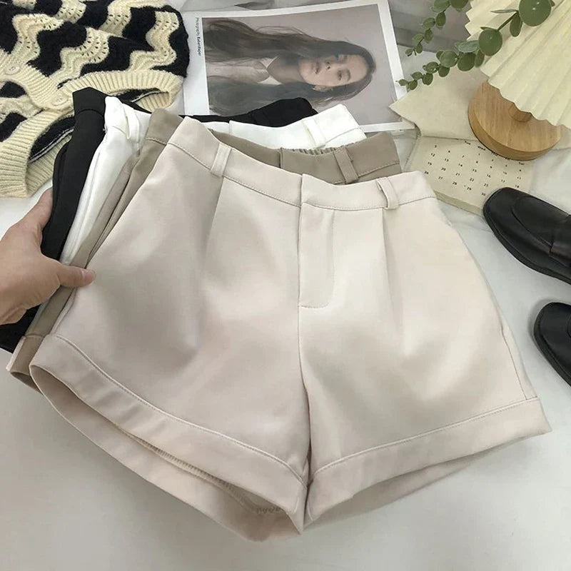 Chic & comfortable women's high waist shorts, ideal for versatile summer fashion from casual to office.