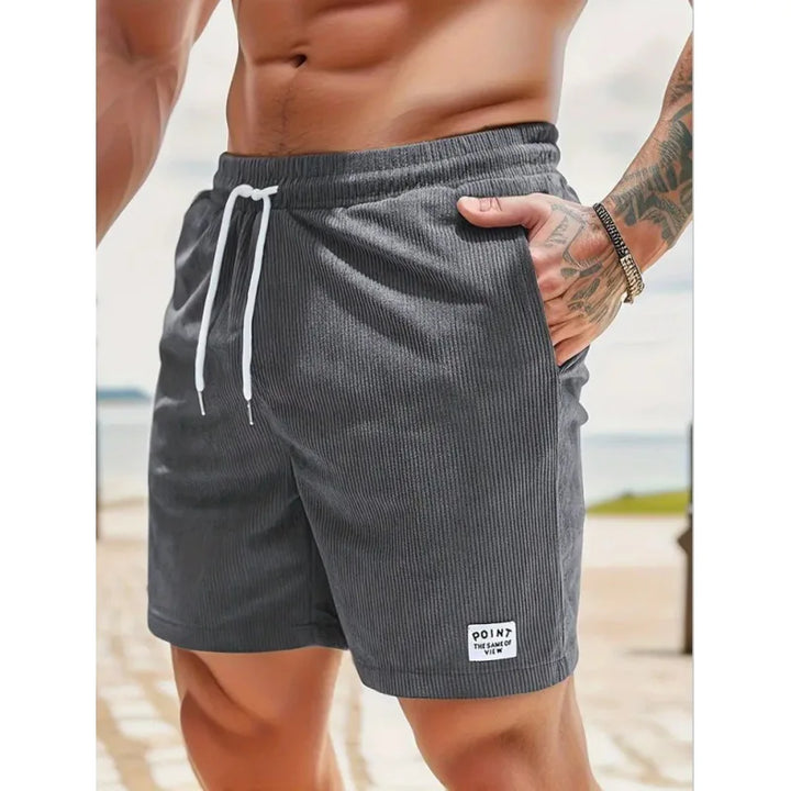 Practical men's casual summer shorts with an adjustable drawstring & relaxed fit for warm weather comfort.