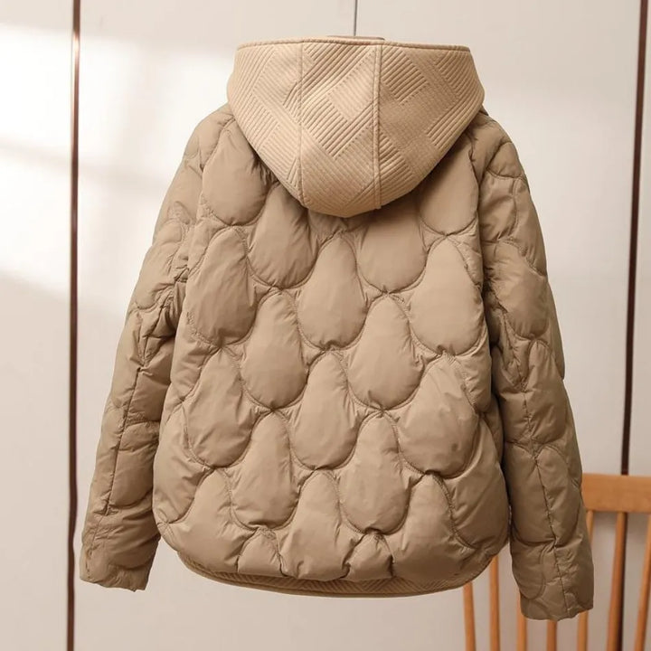 Ladies' Aura winter coat for cold weather & outdoor adventures. A warm puffer jacket for urban fashion.