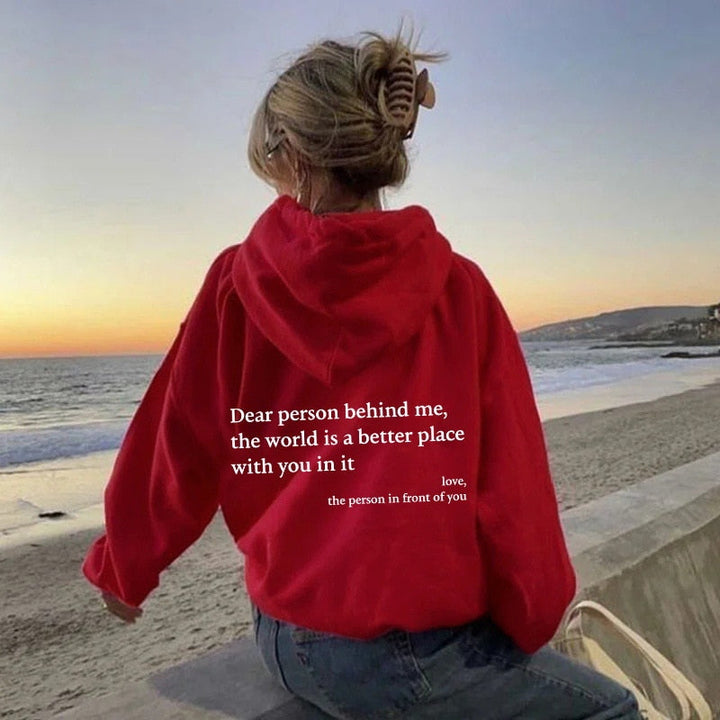 Cozy women's 'Dear Person Behind Me' slogan hoodie. Warm graphic pullover, perfect for comfortable, inspiring casual wear.