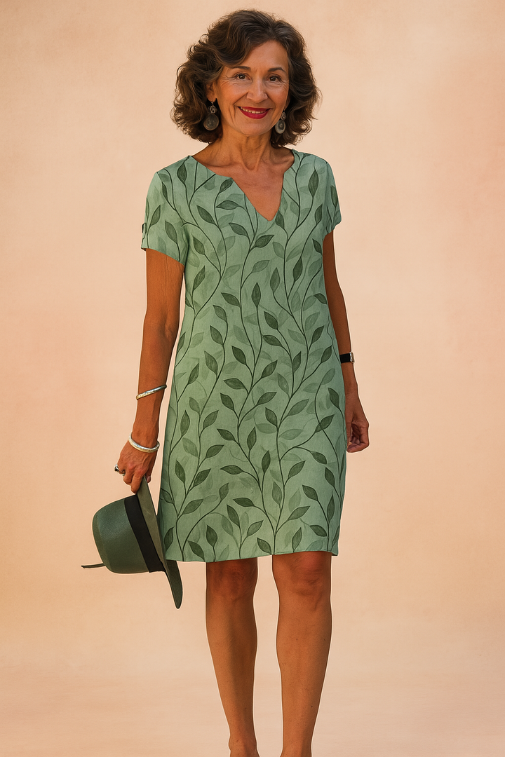 Elegant women's V-neck summer dress for warm weather. Flowy, comfortable & timeless style.