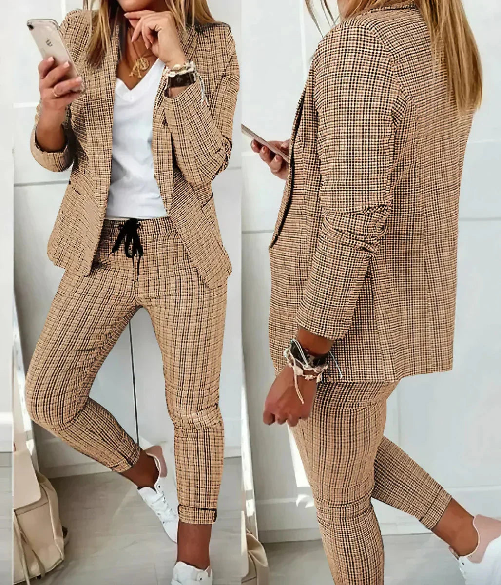 Sophisticated pink women's two-piece suit. Modern business attire for elegant professional workwear.