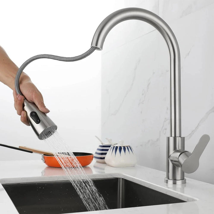 Kitchen sink faucet with powerful pull-out spray head and full 360-degree swivel functionality.