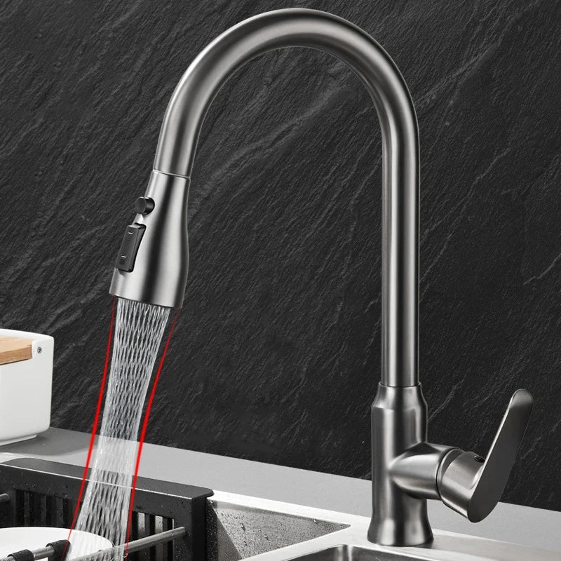 Close-up of modern kitchen faucet's single lever handle and convenient pull-out spray head.