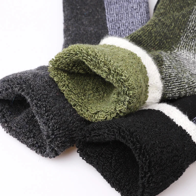 Stay warm with these men's thermal winter socks. Mid-length, 3-pack for cold weather comfort & cozy feet.