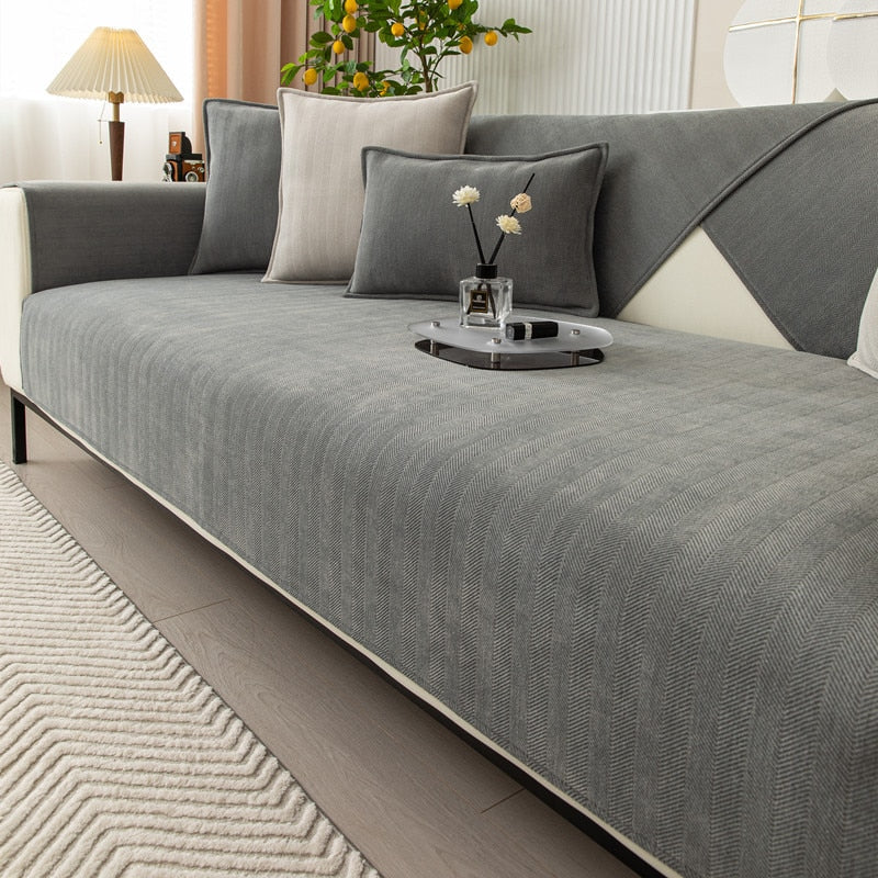 Non-slip chenille sofa cover providing ultimate couch protection for living room furniture.
