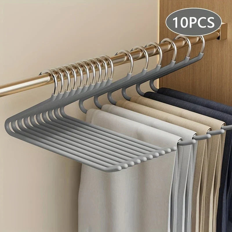 Home organization hero: Open metal trouser hangers. Sturdy, space-saving design for pants, skirts & wardrobe essentials.