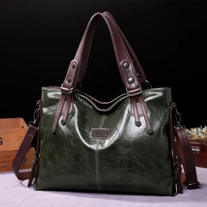 Close-up of premium women's leather crossbody bag. High-quality, durable leather handbag, elegant fashion accessory.