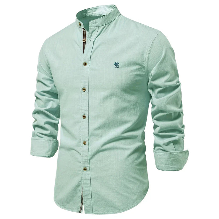 Modern men's slim fit long sleeve button-up shirt. Smart casual & office-ready, essential menswear.