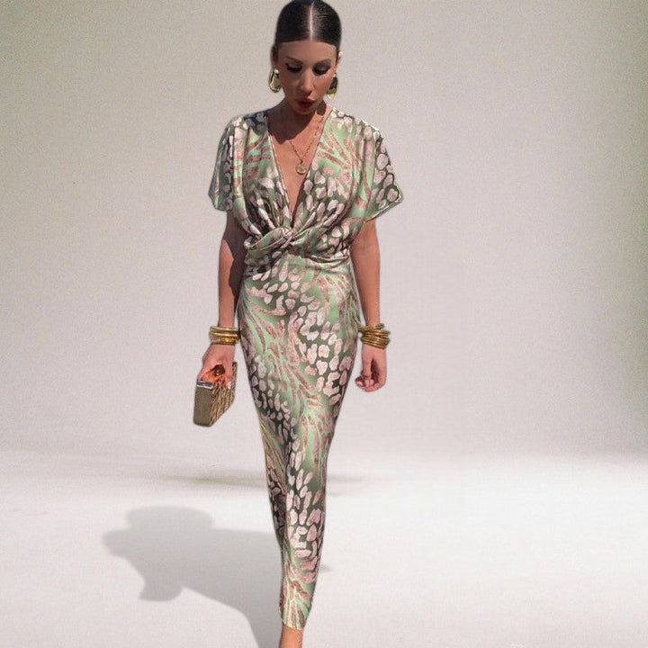 Elegant women's wrap maxi dress, perfect for wedding guests or formal occasions. Features a flattering V-neck.