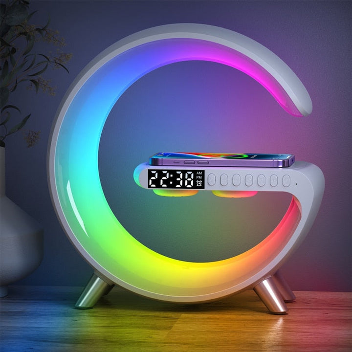 Multifunctional Nvroome Light with wireless charger, RGB speaker, & digital clock for desktop tech & bedroom decor.
