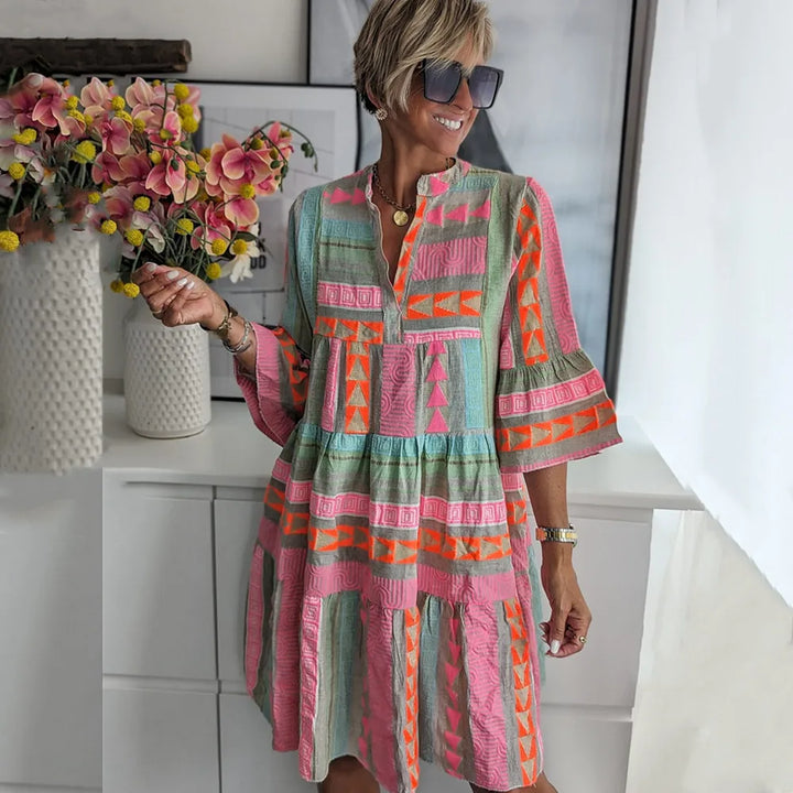Elegant women's A-line ruffle spring dress in soft pink, perfect for feminine fashion & versatile wear.