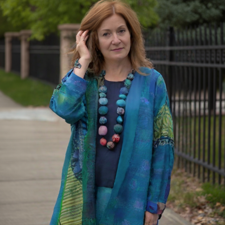 Comfortable women's long open-front cardigan. An all-season, lightweight layering piece for casual elegance.