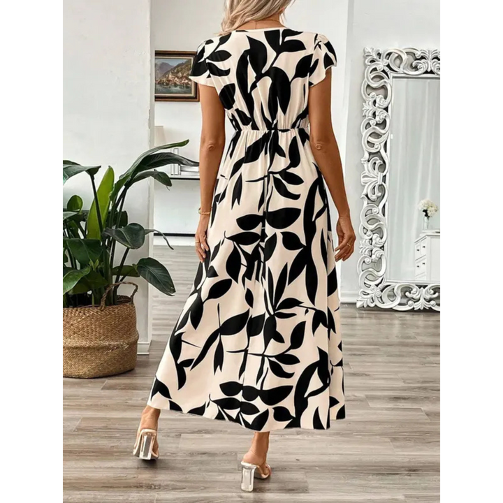 Beautiful women's long botanical print wrap dress, elegant and comfortable, perfect for spring/summer occasions.