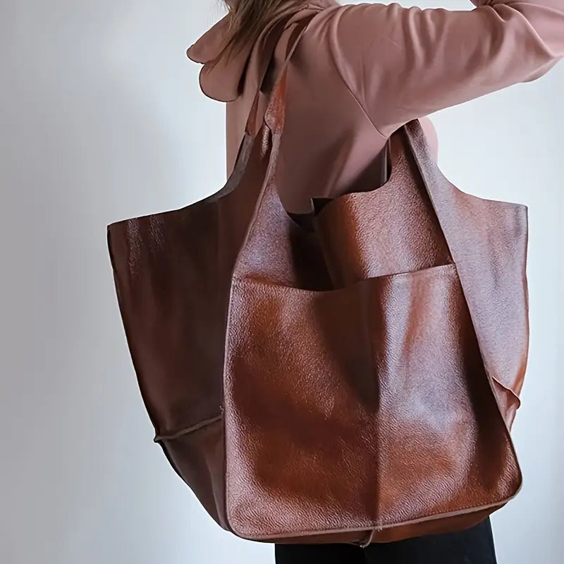 Chic oversized vegan leather work tote bag for women, a stylish large everyday purse.