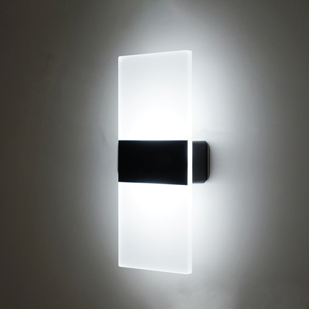 Versatile modern LED wall sconce with motion & touch sensors, rechargeable for stylish home lighting.