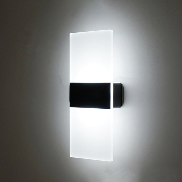 Versatile modern LED wall sconce with motion & touch sensors, rechargeable for stylish home lighting.