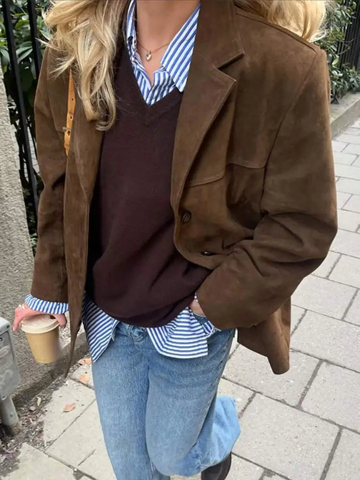 Comfortable brown women's classic jacket, offering timeless style & versatile layering options.